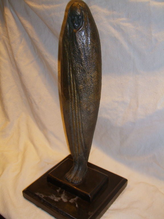 This bronze (we assume and it is not magnetic) we have posted came out of an incredible estate filled with wonderful designer furniture all from the 1960s that we bought and subsequently have sold on this website. Among the designer's were pieces by