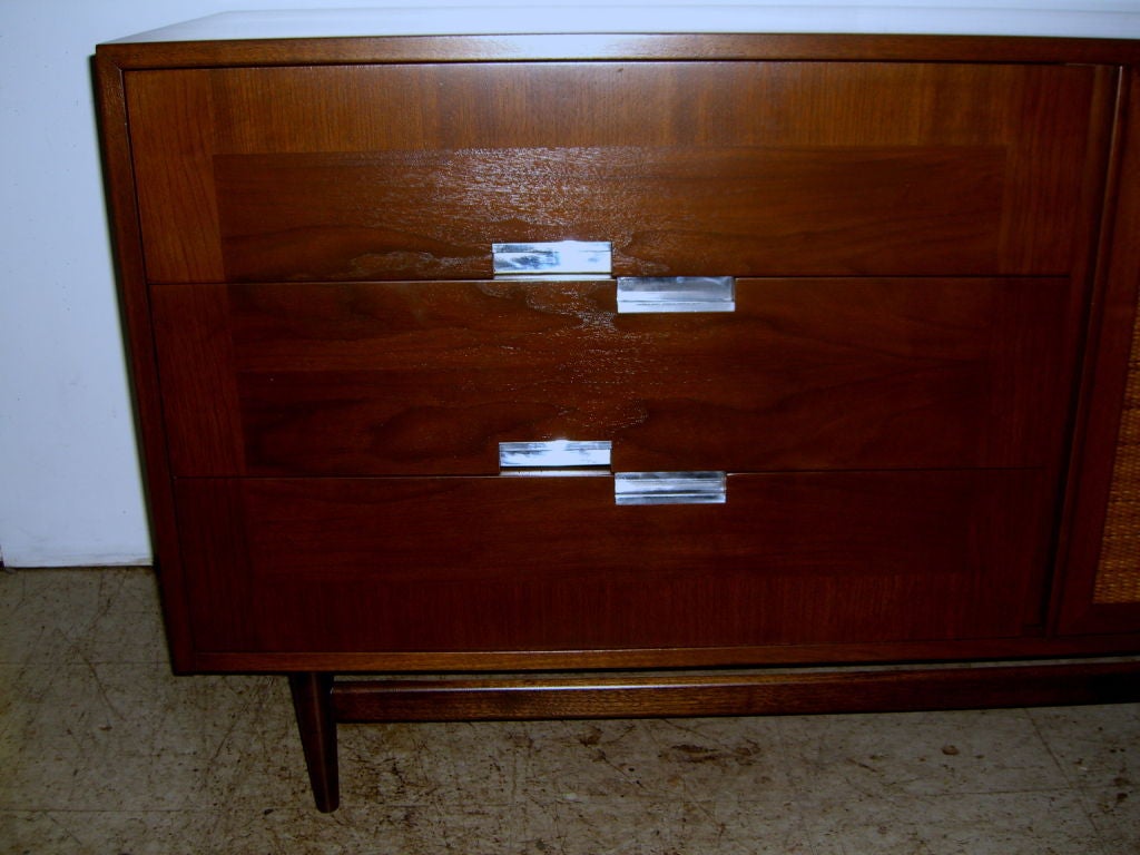 Mid-20th Century American of Martinsville cabinet with caned door aluminum inlay