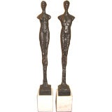 Wonderful pair abstract bronzes man & woman white marble bases