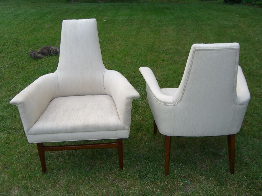 Great pair of unusual high back club chairs in manner of Mccobb