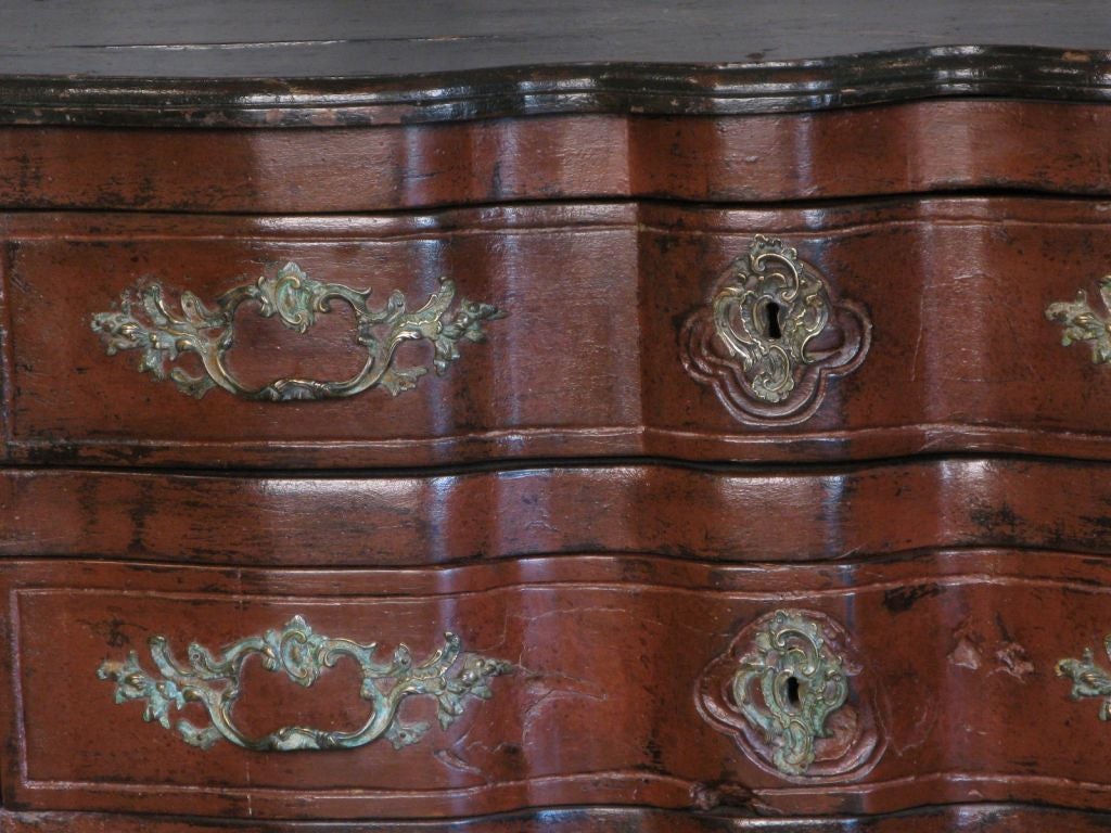 Painted Serpentine Front Commode in Walnut.