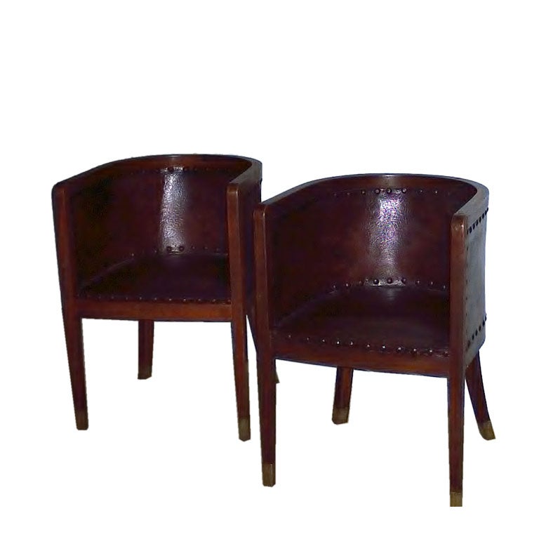 Pair of Leather Barrel Chairs