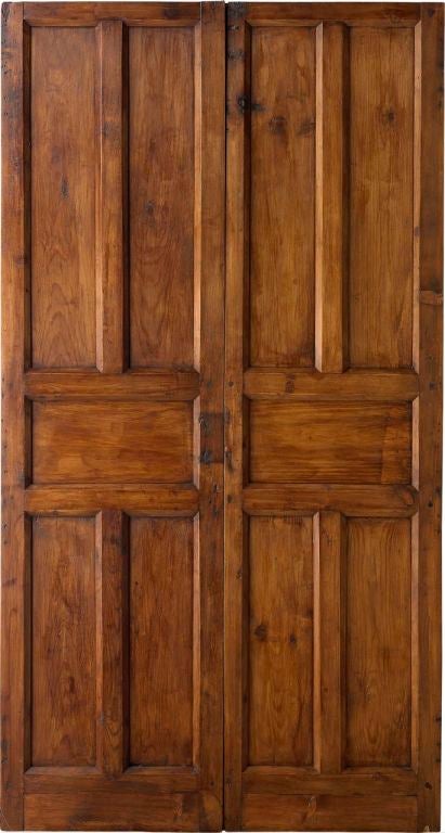 An 18th century antique Spanish double door engraved settings.  Center panels show carved figures.<br />
www.porteradoors.com<br />
*price subject to change based on conversion of 6483 Euros