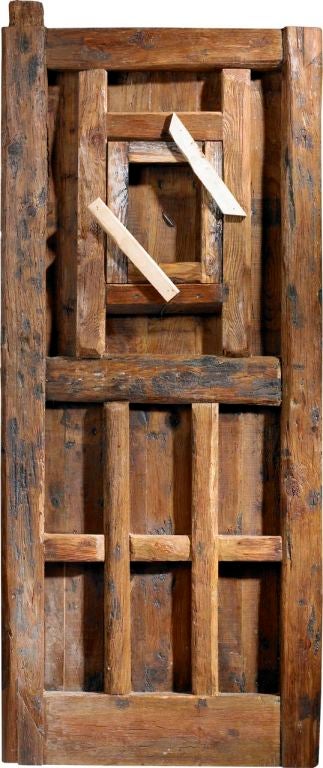 An 18th century antique Spanish door with window and original iron work<br />
www.porteradoors.com<br />
*price subject to change based on conversion of €21,943