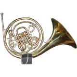 Used mounted brass french horn