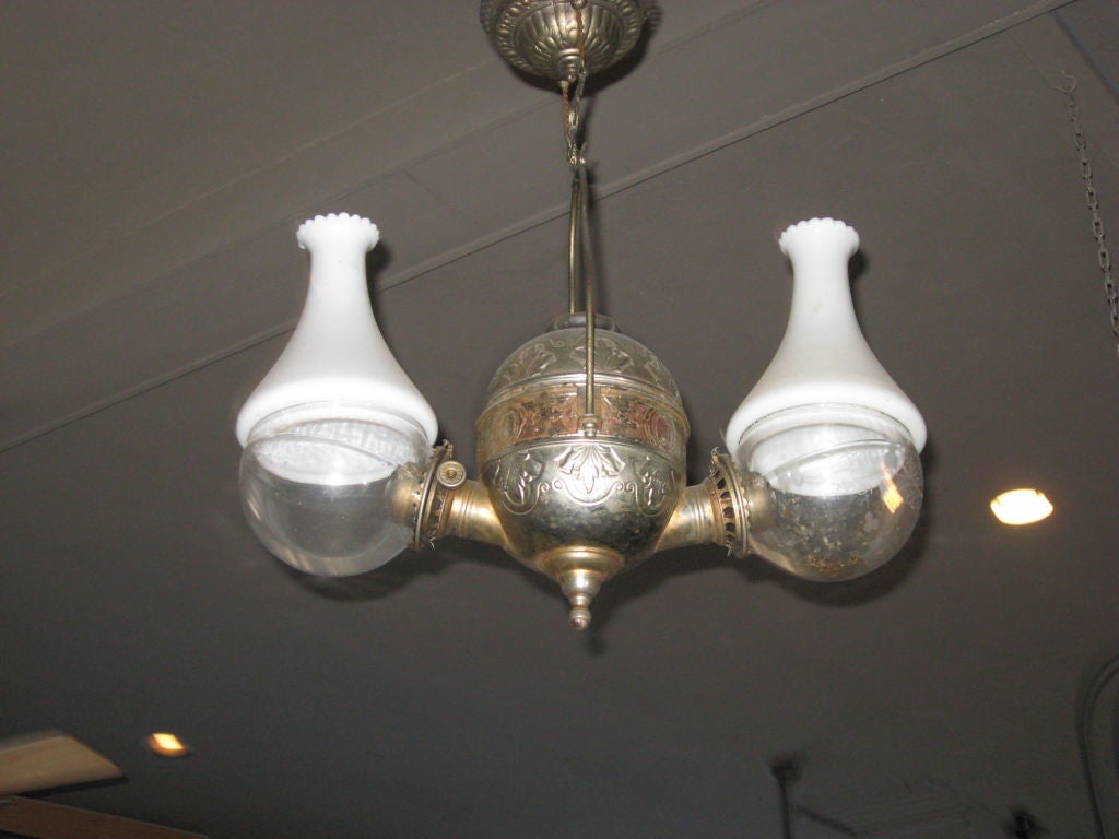 Original unelectrified Anglelamp with original shades and ceiling pully.