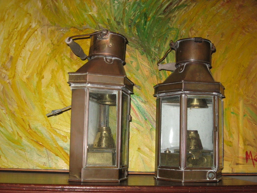 Pair of brass oil lanterns with wooden handles made into wall sconces-Hampton location.