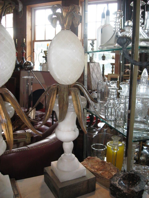 Pair of alabaster and gilded tin pineapple lamp bases. Hampton location.
