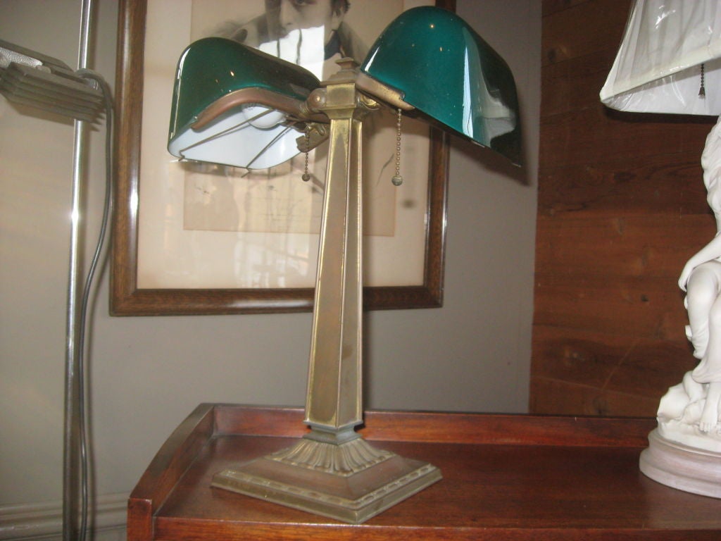 Rare double Emerlite partners desk lamp with original shades and unpolished brass.