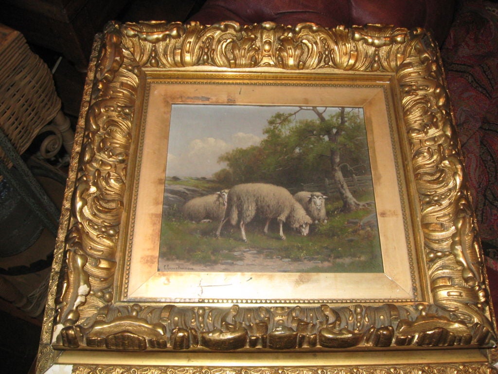 Huile sur bois du 19e siècle représentant des moutons dans un pré par Charles Grant Davidson dans son cadre d'origine en bois doré du 19e siècle ; la taille comprend le cadre.