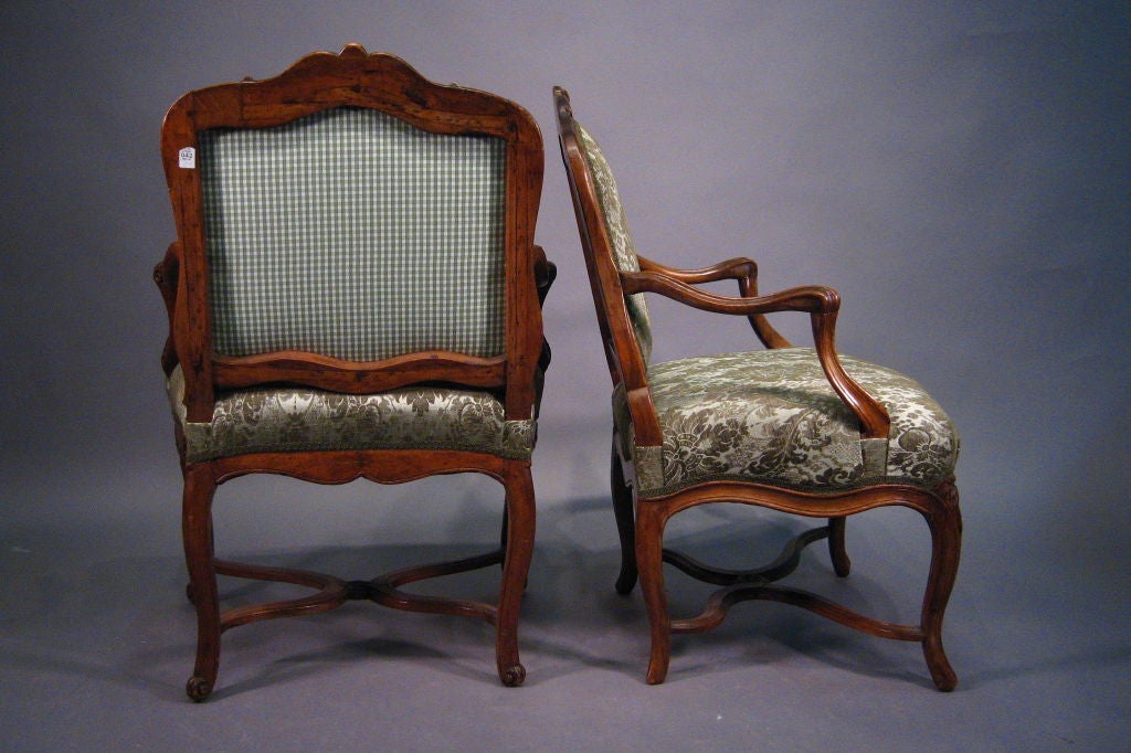 Hand-Carved Matched Pair Regence-period Armchairs in Walnut, France c. 1730