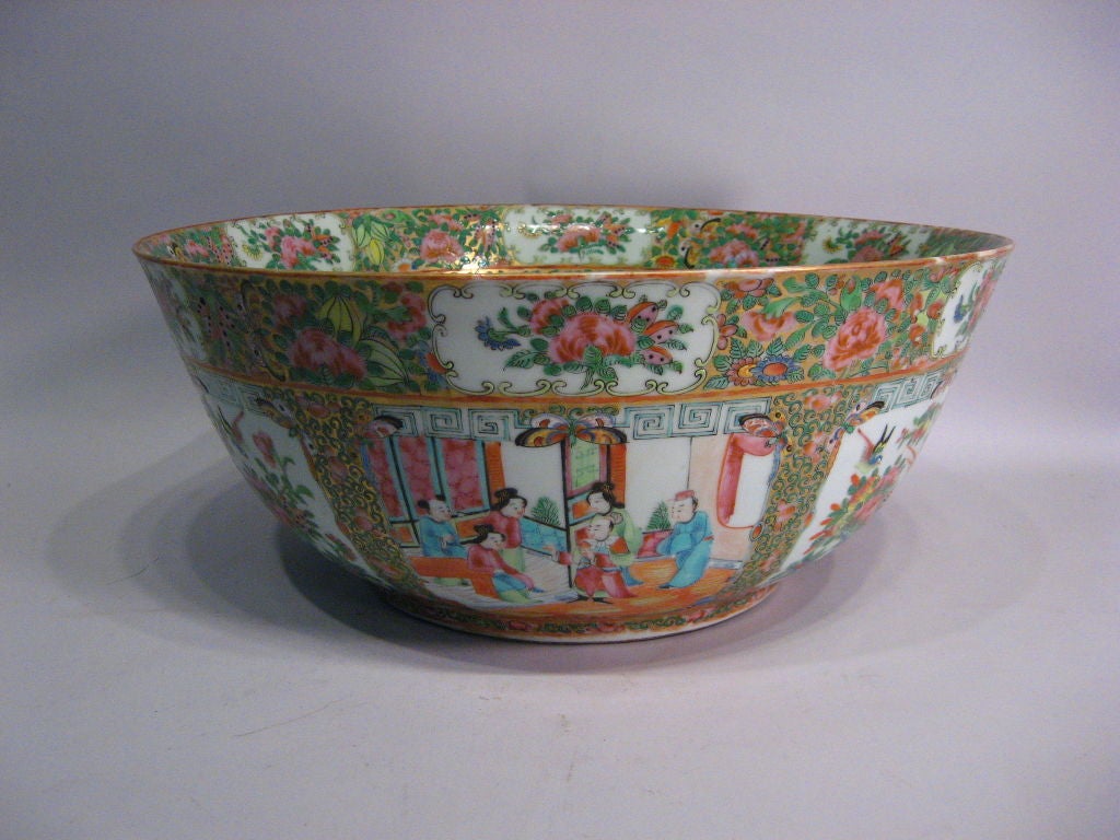 A Chinese porcelain punch bowl, 16 inches in diameter, and decorated in the richly-enameled Rose Medallion pattern. Dating from the mid-1800s, and originating in the Jingdezhen-Canton region of southern China. <br />
<br />
The Rose Medallion