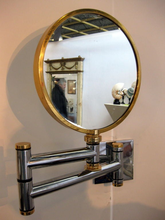 This is a very heavy , very well made mirror by Carl Springer.