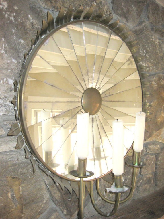 mirror with three candle holders