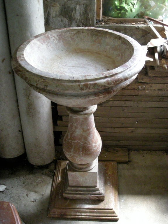 A  very fine quality early 18th century carved baptismal font in Brescia marble, from a baroque church in the Ticino region of Southern Switzerland. Photos were taken just upon unpacking from shipping crates. Marble hasn't yet been cleaned.