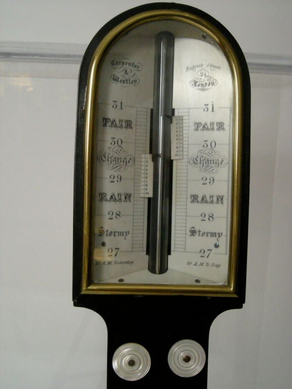 Fine quality ebonized stick barometer by Carpenter and Westley, London, with dual bone scales marked 