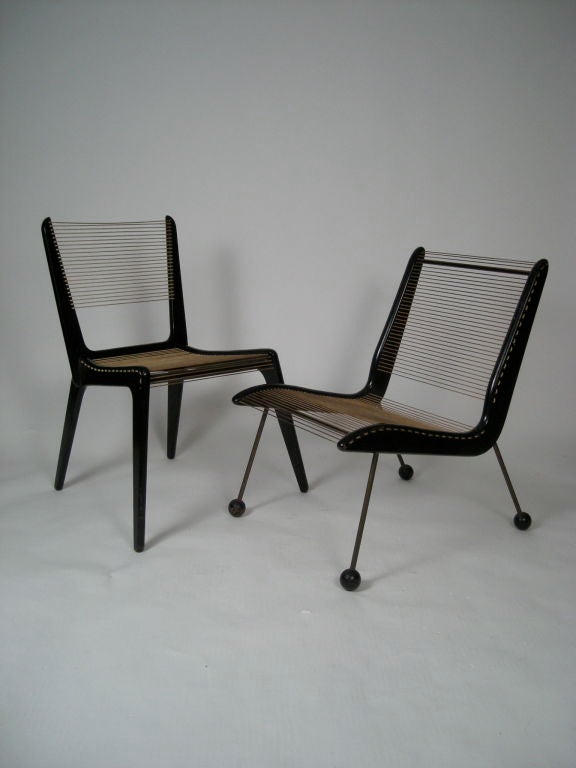 Two cord chairs designed by Jacques Guillon in ebonized birch and walnut with nylon cord seats and backs, the left chair with boomerang-form legs, the right chair with patinated tubular brass legs terminating in ebonized black metal ball feet.<br