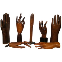 COLLECTION OF  WOOD HAND AND GLOVE MODELS