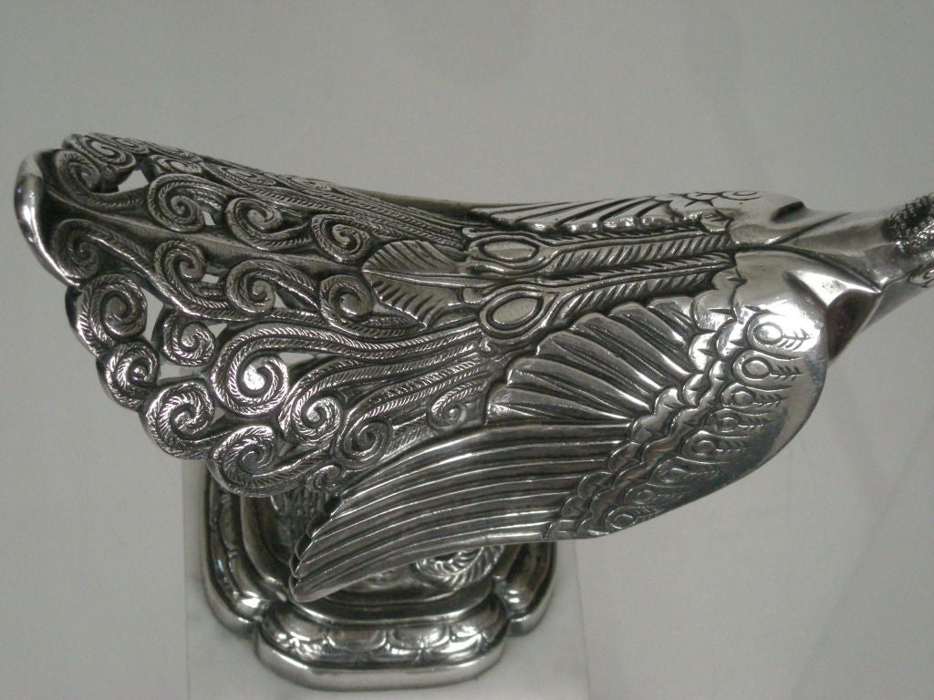 A FINE FRENCH ART DECO PEACOCK AUTOMOBILE MASCOT