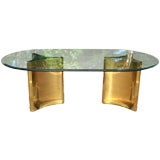 Glass and double brass pedestal dining table by Mastercraft