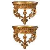 Pair of large carved giltwood wall brackets