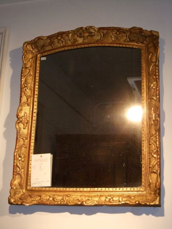 Giltwood Regency mirror with original finish and mercury glass. Some loss of gilding.