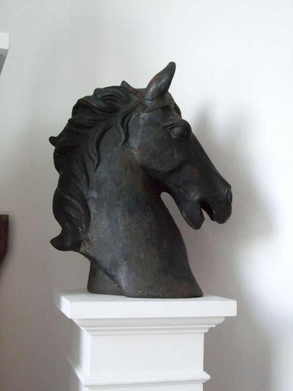 A Wonderful cast iron horse head with nice patina.