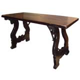 Spanish coffee table with iron stretcher