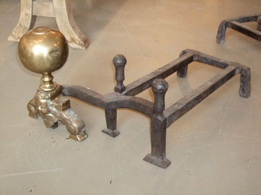 19th Century Pair of Double-Arm Andirons with brass finials and angels.