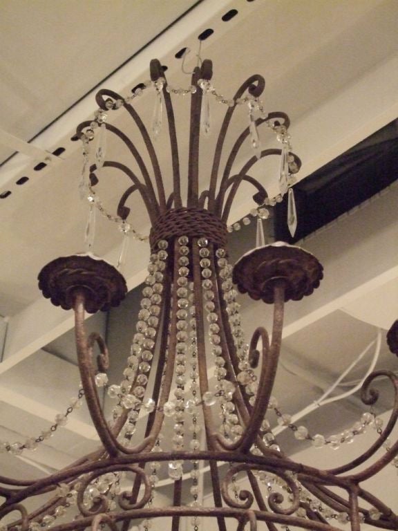 Wrought Iron Pair of Vintage Iron and Crystal Chandeliers For Sale