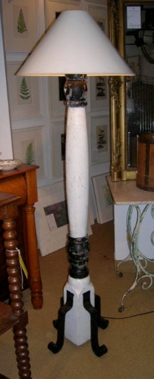Pair of baluster form floor lamps on iron feet