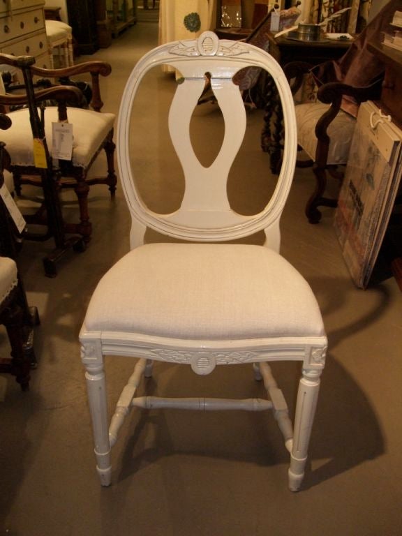 Set of six white painted side chairs