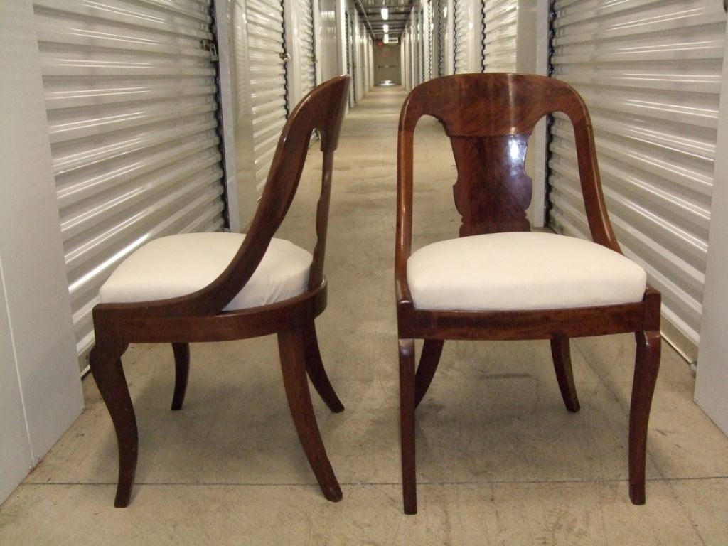 American Pair of spoon backed Mahogany chairs