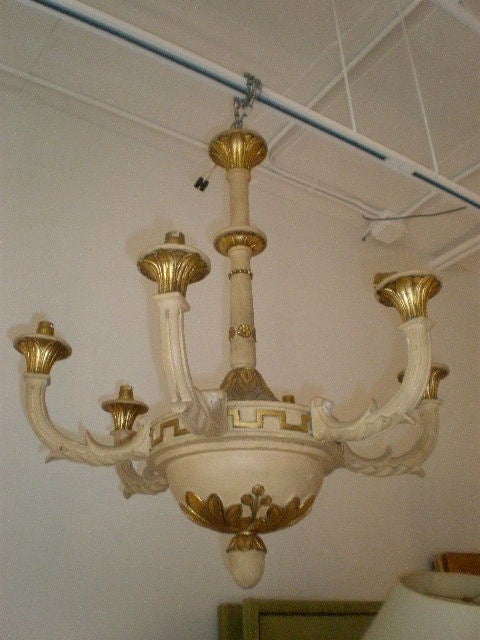 Paint and gilt chandelier with Greek key and acanthus leaf decoration.