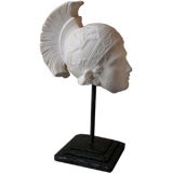 Carved marble fragment on stand Carved marble fragment on stand