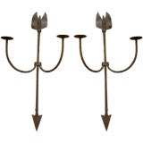 Pair of wrought iron arrow sconces
