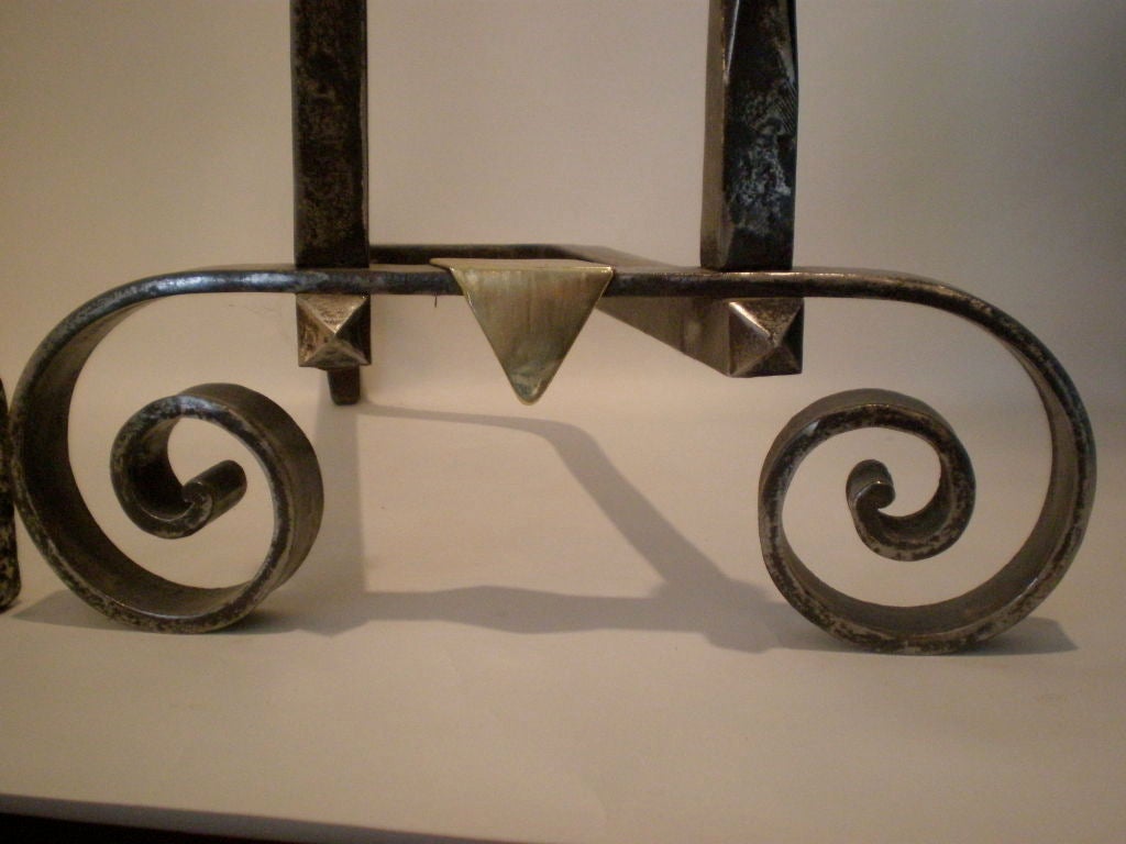 Pair of 19th Century double scroll base andirons with brass acorn finials and triangle detail.