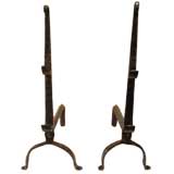 Pair of tall andirons with incised decoration