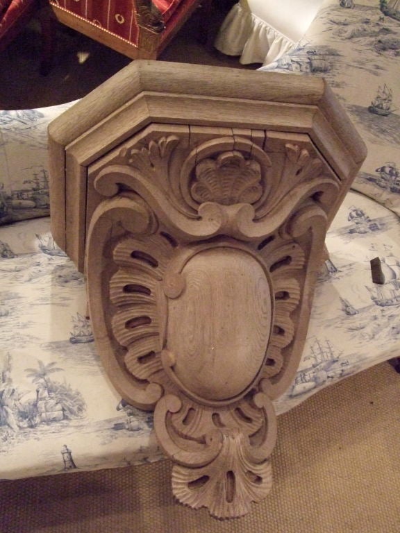 Pair of 19th century large-scale carved oak brackets with scroll and shell decoration.