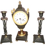 French Empire Bronze Mantle Clock and Pair Candlesticks