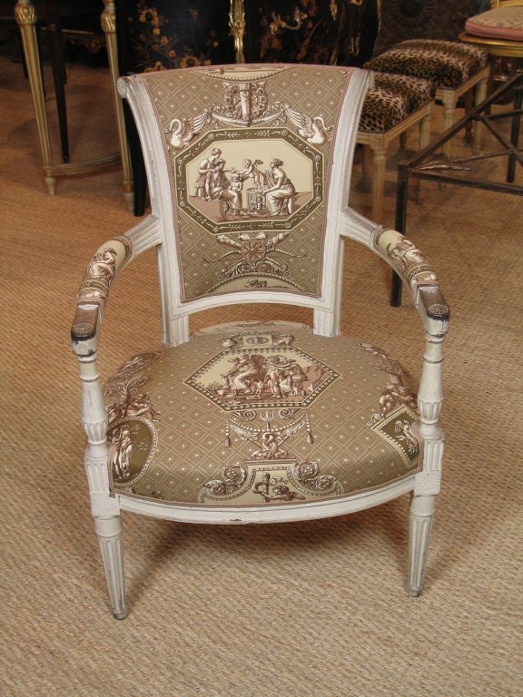 Pair of French painted fauteuils, period Directoire, newly-upholstered in museum reproduction cotton toile fabric. Paint appears original.