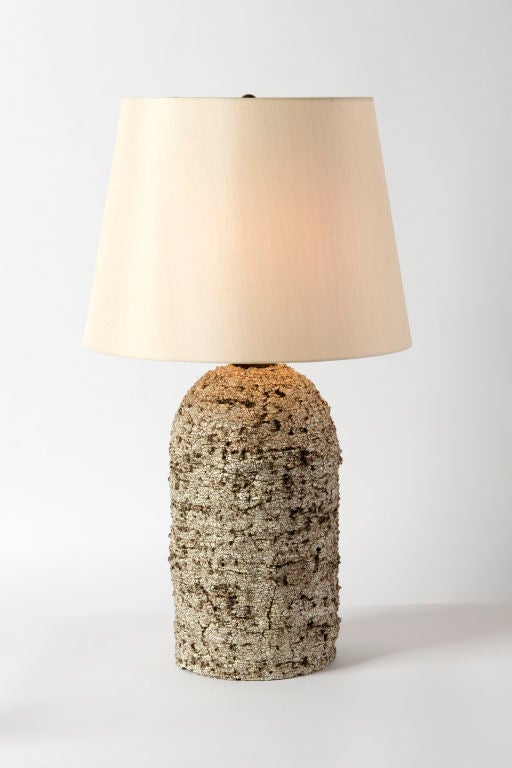 PAIR AVAILABLE / $1,500 EACH<br />
This unique pair of lamps was created exclusively for Belvedere by cermacist Peter Lane. The glaze and texture are earthy and and have an obvious handmade quality. The artist's technique results in a vessel that