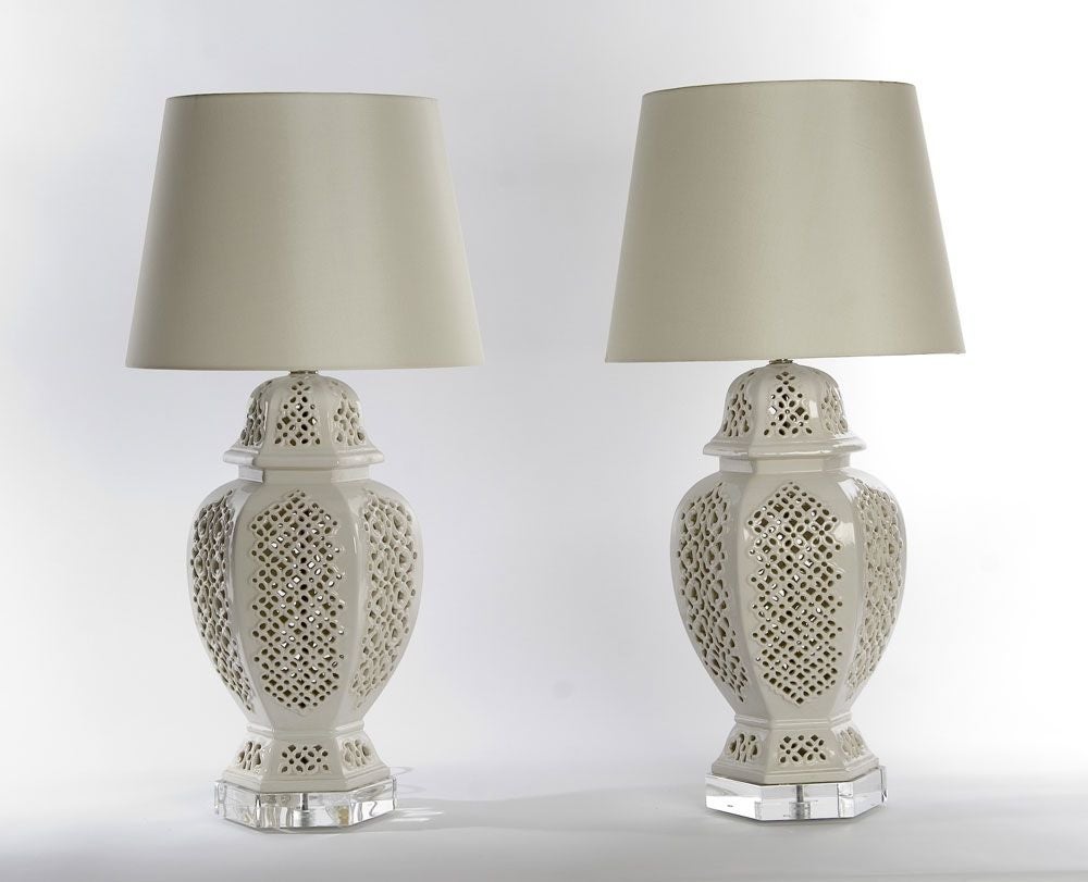 PAIR AVAILABLE / $1,650 Each<br />
This gorgeous lamp looks like a cross between Marrakesh and Palm Beach. The traditional ginger jar style vessel has been given an exotic twist with layers of intricate lattice-work. Two distinct patterns decorate