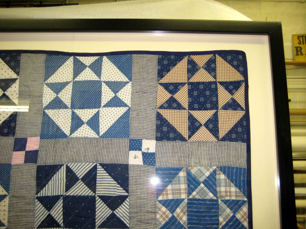 Exquisitely framed Ohio Star quilt from the 30's.<br />
Quilt approx. dimensions: 70
