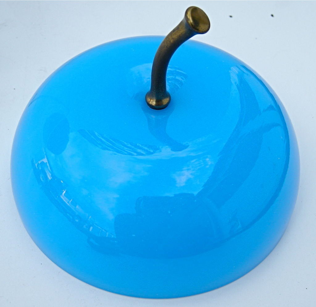 Elegant blue opaline glass container with an apple motif.  A beautiful and tempting accessory.