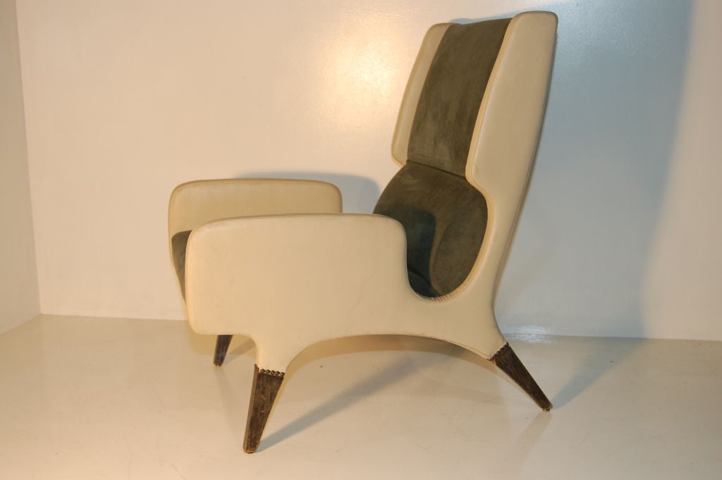 Gio Ponti Armchair from the Parco Dei Principi Hotel , Rome . Manufactured by Cassina in white Skai sides and deep green Alcantara seat and back , wood legs with brass detail . Stunning form , ...also available a pair of low back armchairs .