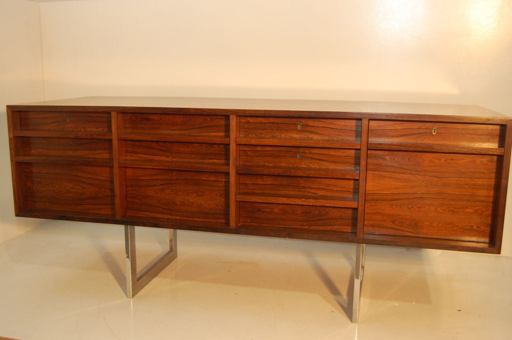 Bodil Kjaer for E. Pederson , Denmark . Vintage four section Credenza in Rosewood . Right hand section pulls down to reveal 3 rosewood fronted pull out finger drawers with storage under , middle right has 3 pull out drawers , left 2 have file