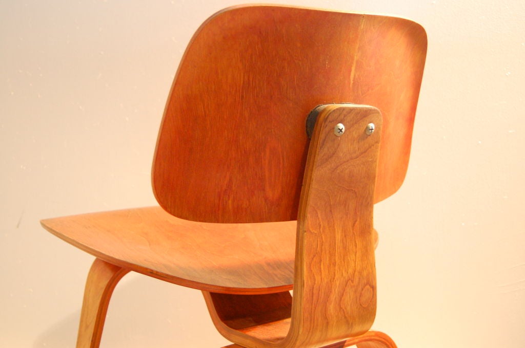 CHARLES AND RAY EAMES ; EVANS DCW IN RED 1
