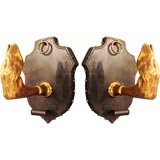 Pair of  leather coat hooks by Jacques Adnet