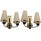 Pair of black painted metal and brass wallights